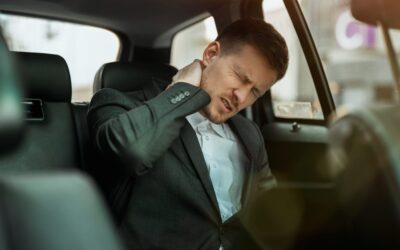 Чому виникає біль у спині після тривалих поїздок